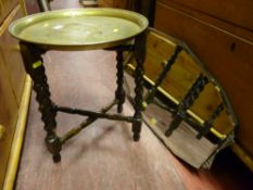 Brass topped folding table on barley twist supports and a vintage bevelled edge wall mirror