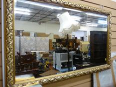 Modern gilt framed wall mirror