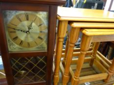 Set of three light wood side tables and a reproduction mahogany wall clock