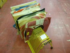 Small selection of vintage 45rpm records in a stand