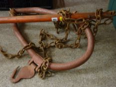 Pair of metal horse hames and a chained yoke
