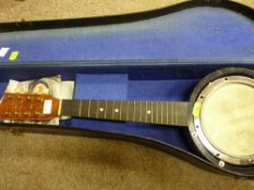 Cased vintage banjo (for restoration), the skin with unverified signature of George Formby