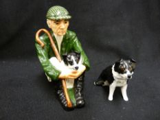 Shebeg I.O.M. - seated pottery figure of a shepherd with his dog, plus an additional collie dog
