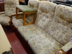 Country style three seater settee, matching armchair and a non-matching G-Plan footstool