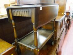 Draw leaf table, a Priory style tea trolley and a barley twist occasional table