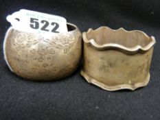 Two silver non-matching napkin rings, 1.9 ozs