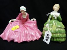 Two Royal Doulton figurines 'Polly Peachum, Beggar's Opera' HN549 and 'Belle' HN2340