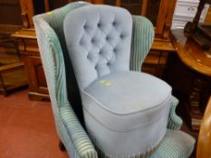 Classical wingbacked armchair and an upholstered bedroom chair