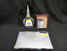Facet glass drink's stopper, a vintage lighter and lighter/cigarette case