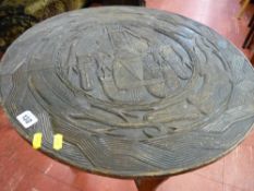 African carved top circular occasional table