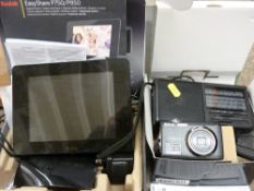 Nikon Coolpix digital camera with accessories, a Kodak Easyshare P750 digital frame (boxed) and a