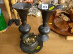 Pair of brass Persian style vases and an Eastern white metal cup and saucer