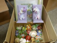 Quantity of collectable fruit ornaments, pair of clown bookends and a selection of embroidered