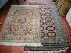 Marks & Spencer Kashan rug and another Pakistan rug