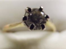 An 18 ct gold solitaire .70 carat diamond, size O