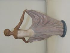 Lladro bisque figure, modelled as a dancer with ou