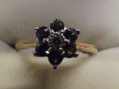 An 18 ct gold tourmaline and diamond ring, size M