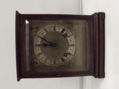 Four glass mahogany cased mantel clock, quarter ho