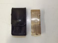Dunhill 14ct gold cigarette lighter with case