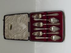 Cased set of six silver grapefruit spoons , Sheffi