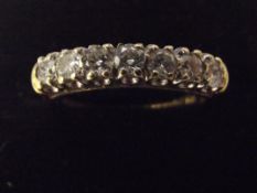 18 carat gold half eternity ring with 0.5 carat di