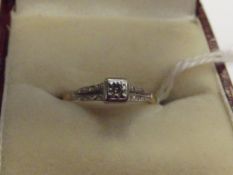 18 ct gold diamond solitaire ring, size H 1/2