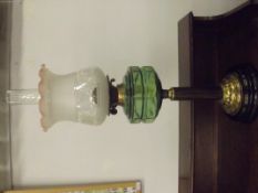 Victorian oil lamp with green reservoir