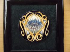 Framed and mounted Moorcroft wall plaque in the Co