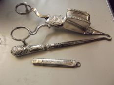 Silver Button Huck, Pair of Grey scissors and a Si
