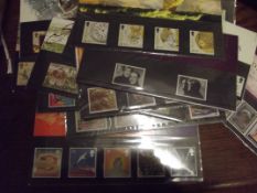A Collection of 14 Presentation Pack Stamps