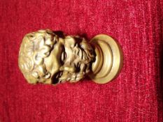 Old brass seal 3 faced head