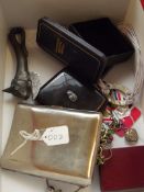 Box to include a cigarette case and a vintage bott