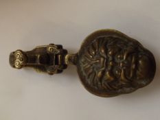 Brass Oriental hook, signed