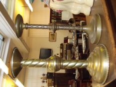 Two brass church candle sticks