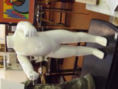 Child's white mannequin shop display