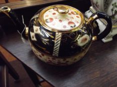 Franklin Mint 'Birds and Flowers of the Orient' porcelain teapot and stand, with COA