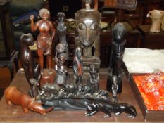 Large collection of ethnic carvings