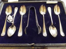 Cased set of silver spoons with sugar tongs