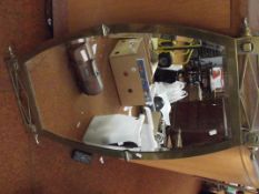 Brass framed mirror in the arts and crafts style