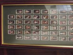 Collection of framed double sided cigarette cards
