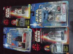 Four Star Wars figures