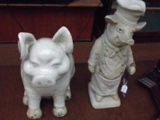 Two stoneware pigs