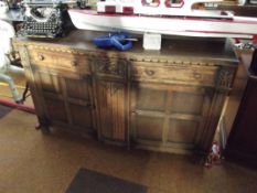 Carved oak sideboard