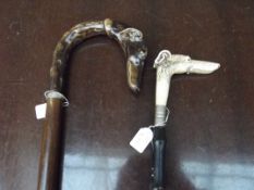 Shoe horn and walking stick, both in the form of g