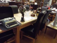 Good quality light oak dining table with floating
