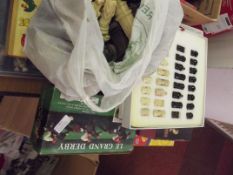 Assorted board games, chess boards, football books