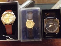 Three wristwatches