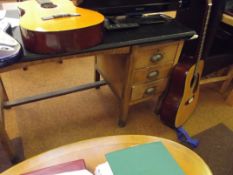 Single pedestal writing desk with three side drawe