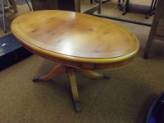 Regency style yew wood coffee table