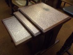 Nest of three retro tables with hammered copper to